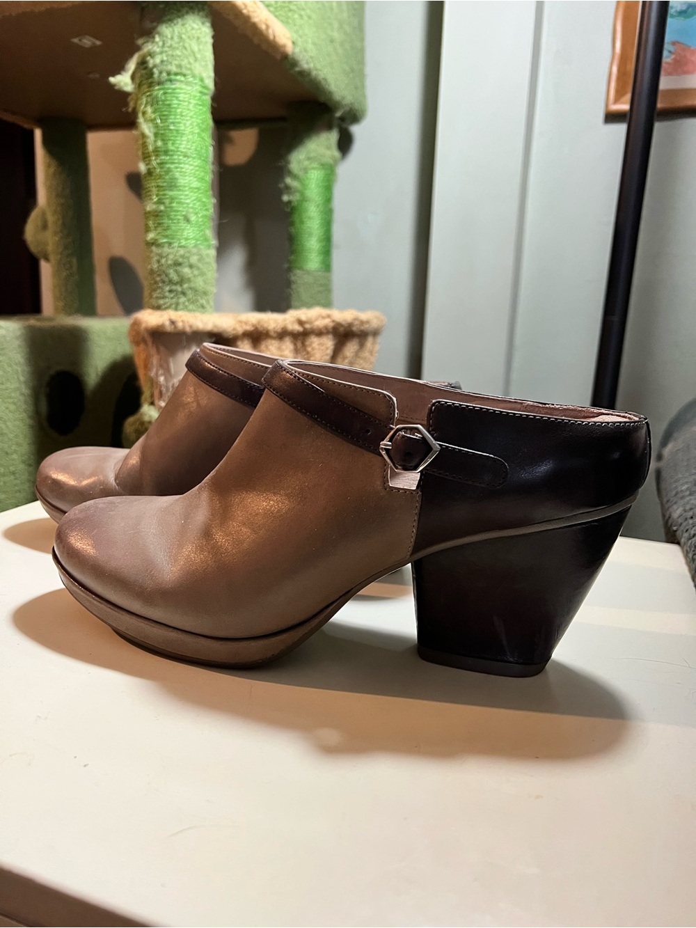 Dansko Malissa Leather mule backless clog with buckle strap across instep.